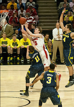 Nik Stauskas (11), Trey Burke (3) and Mitch McGary (4)