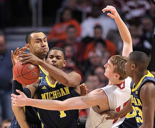 Glenn Robinson III (1), Jon Horford (15), and Caris LeVert (23)