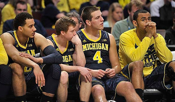 Jordan Morgan (52), Spike Albrecht (2),  Mitch McGary (4), and Jon Horford (15)