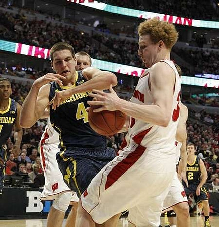 Glenn Robinson III (1), Mitch McGary (4), and Spike Albrecht (2)