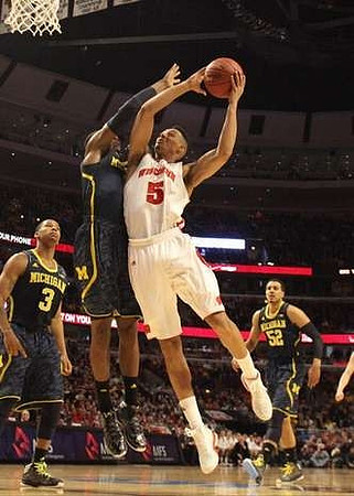 Trey Burke (3), Glenn Robinson III (1), and Jordan Morgan (52)