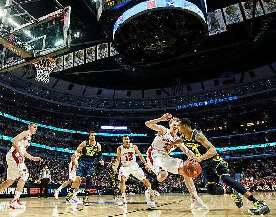 Jordan Morgan (52) and Trey Burke (3)