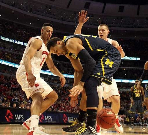 Jordan Morgan (52) and Tim Hardaway Jr. (10)