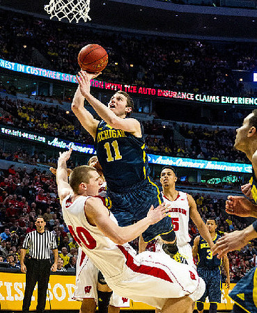 Nik Stauskas (11) and Trey Burke (3)