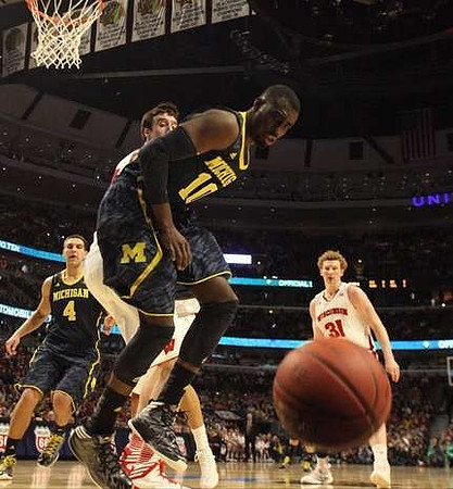 Mitch McGary (4) and Tim Hardaway Jr. (10)