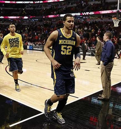 Jon Horford (15) and Jordan Morgan (52)