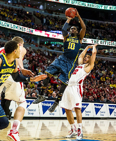 Jordan Morgan (52) and Tim Hardaway Jr. (10)