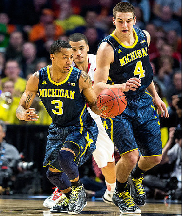 Trey Burke (3) and Mitch McGary (4)