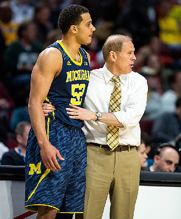 Jordan Morgan (52) and John Beilein
