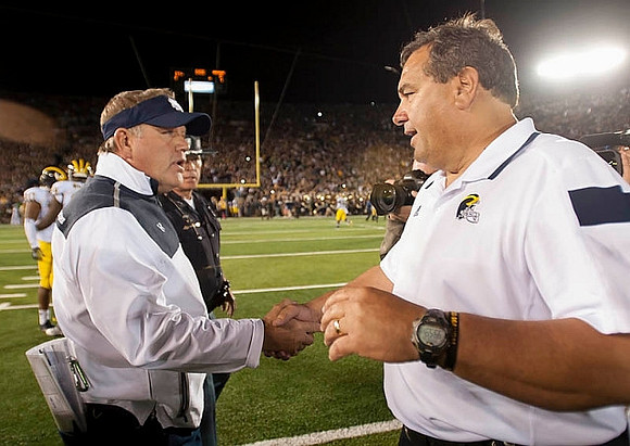 Notre Dame Coach Brian Kelly and Brady Hoke