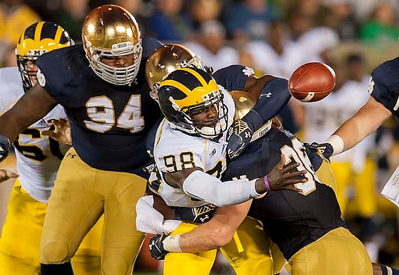 Devin Gardner (98) and Graham Glasgow (61)