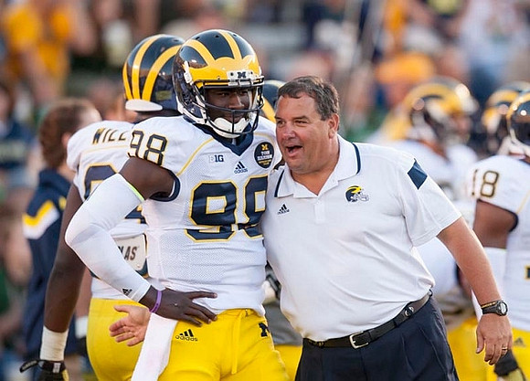 Devin Gardner (98), Brady Hoke, and A.J. Williams (84)