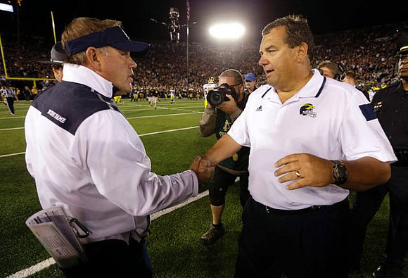 Notre Dame Coach Brian Kelly and Brady Hoke
