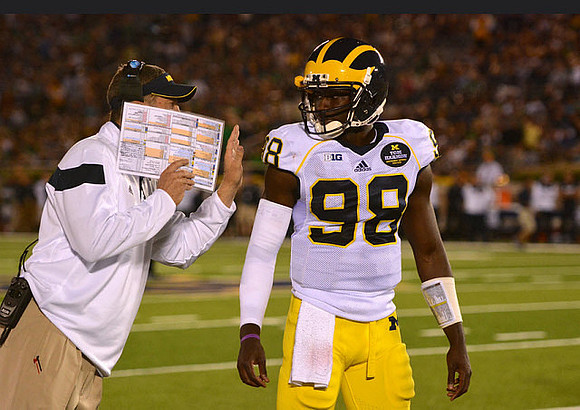 Doug Nussmeier and Devin Gardner (98)