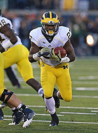 Devin Gardner (98) and Derrick Green (27)