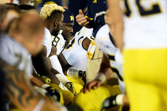 De'Veon Smith (4) and Devin Gardner (98)