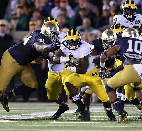 De'Veon Smith (4) and Devin Gardner (98)