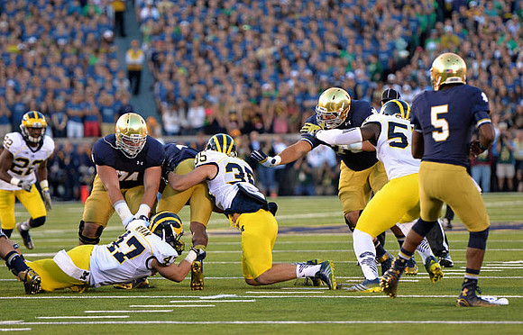 Jarrod Wilson (22), Jake Ryan (47), Joe Bolden (35), and Frank Clark (57)