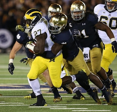 Derrick Green (27) and Jack Miller (60)