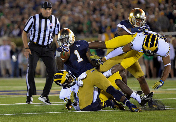 Jourdan Lewis (26) and Jeremy Clark (34)