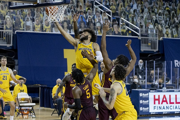 Franz Wagner (21), Isaiah Livers (2), and Brandon Johns Jr. (23)