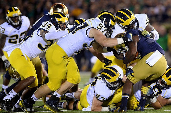 Jarrod Wilson (22), Jeremy Clark (34), Brennen Beyer (97), Jake Ryan (47), and Ondre Pipkins (56)