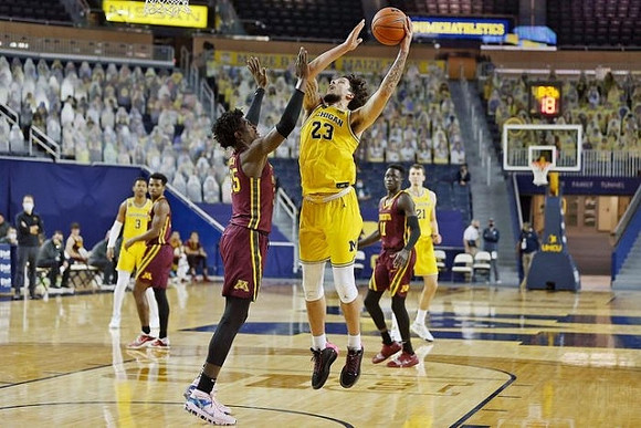 Zeb Jackson (3), Brandon Johns Jr. (23), and Franz Wagner (21)