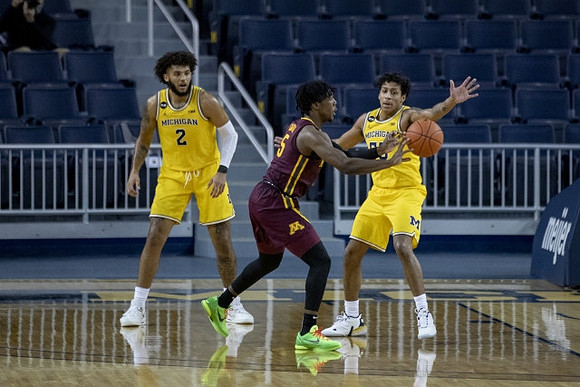 Isaiah Livers (2) and Eli Brooks (55)