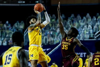 Chaundee Brown Jr. (15) and Isaiah Livers (2)
