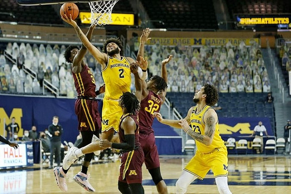 Isaiah Livers (2) and Brandon Johns Jr. (23)