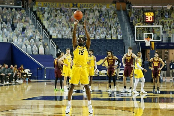 Chaundee Brown Jr. (15), Franz Wagner (21), Isaiah Livers (2), and Zeb Jackson (3)