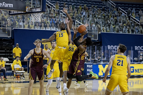 Chaundee Brown Jr. (15), Eli Brooks (55), and Franz Wagner (21)