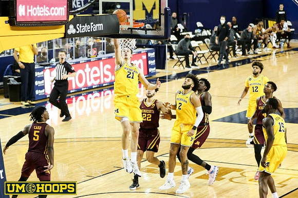 Franz Wagner (21), Isaiah Livers (2), Mike Smith (12), and Chaundee Brown Jr. (15)