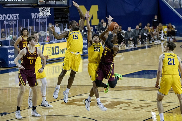 Franz Wagner (21), Chaundee Brown Jr. (15), Eli Brooks (55), and Franz Wagner (21)