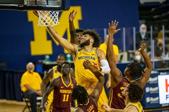 Isaiah Livers (2), Chaundee Brown Jr. (15), and Brandon Johns Jr. (23)