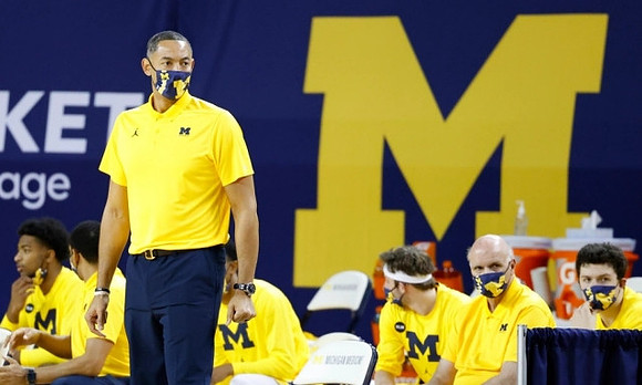 Juwan Howard, Phil Martelli, and Michigan Team
