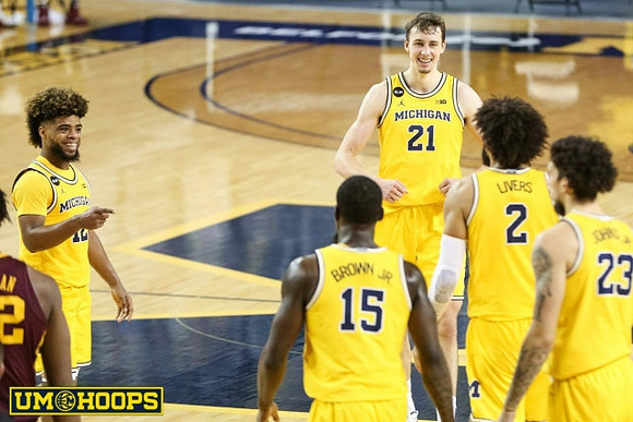 Mike Smith (12), Chaundee Brown Jr. (15), Franz Wagner (21), Isaiah Livers (2), and Brandon Johns Jr. (23)