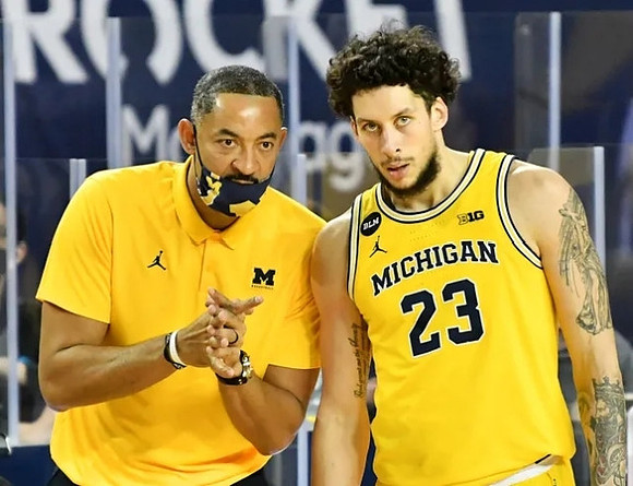 Juwan Howard and Brandon Johns Jr. (23)