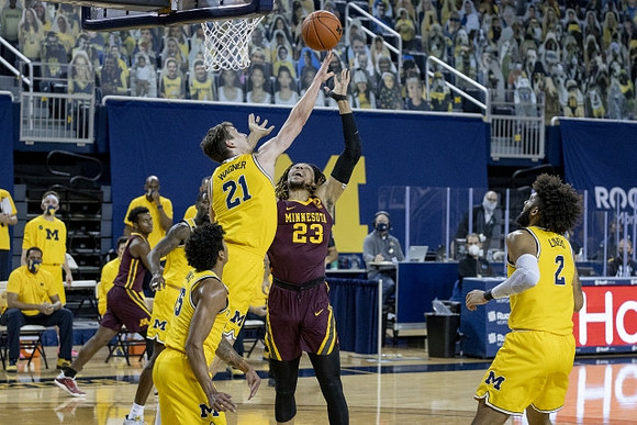 Eli Brooks (55), Franz Wagner (21), and Isaiah Livers (2)