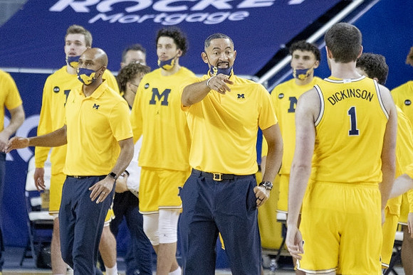 Saddi Washington, Juwan Howard, Hunter Dickinson (1), and Michigan Team