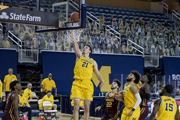 Franz Wagner (21), Isaiah Livers (2), and Chaundee Brown Jr. (15)