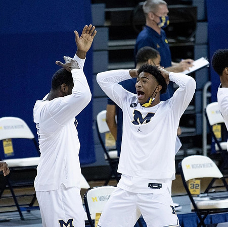 Chaundee Brown Jr. (15) and Jace Howard (25)