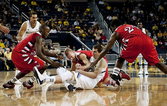 Jordan Morgan (52) and Nik Stauskas (11)