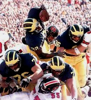 Anthony Thomas (32), Steve Hutchinson (76), Jon Jansen (77), and Aaron Shea (36)