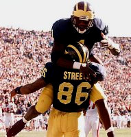Tai Streets (86) and David Terrell (1)