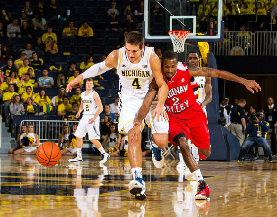 Mitch McGary (4), Spike Albrecht (2), and Tim Hardaway Jr. (10)
