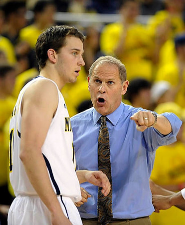 Nik Stauskas (11) and John Beilein