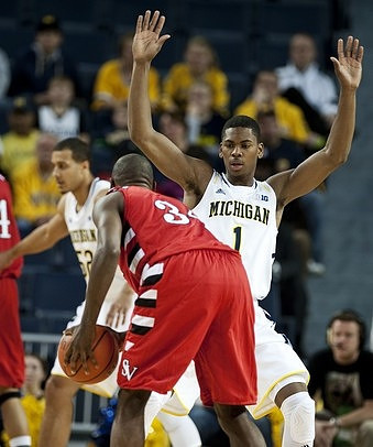 Jordan Morgan (52) and Glenn Robinson III (1)