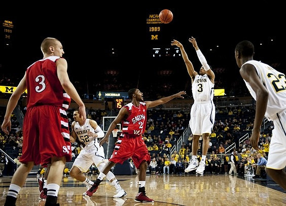 Jordan Morgan (52), Trey Burke (3), and Caris LeVert (23)