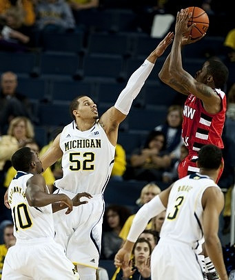 Tim Hardaway Jr. (10), Jordan Morgan (52), and Trey Burke (3)